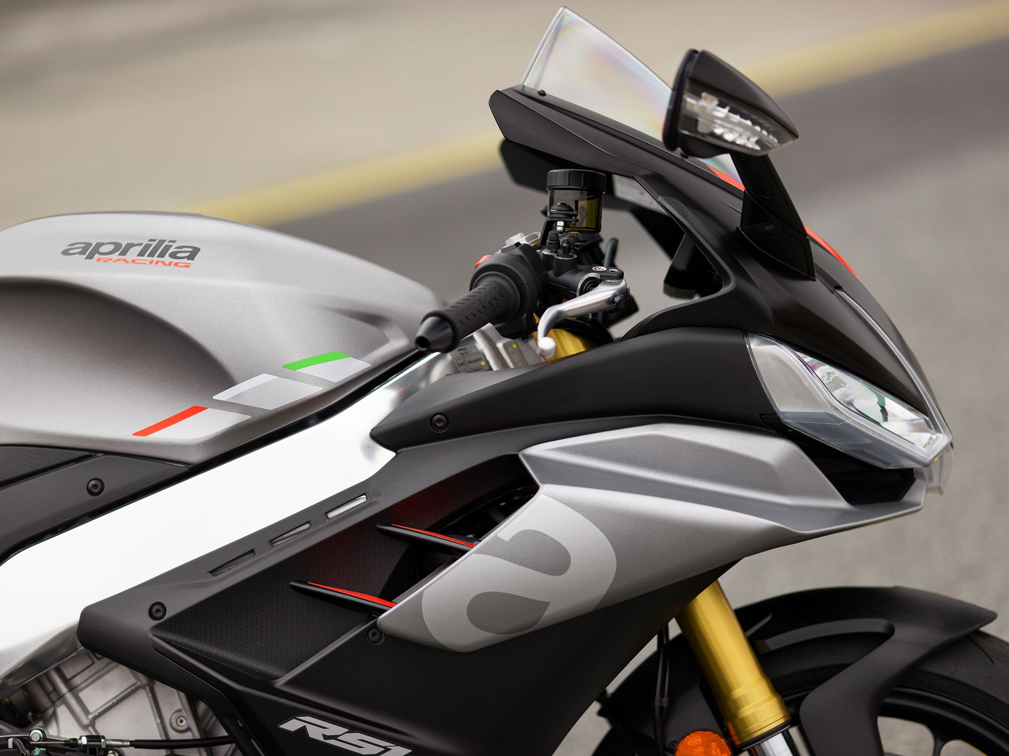 The 2021 RSV4 sports a wider front fairing that does a better job of keeping the rider’s torso in a cocoon like bubble of speed.