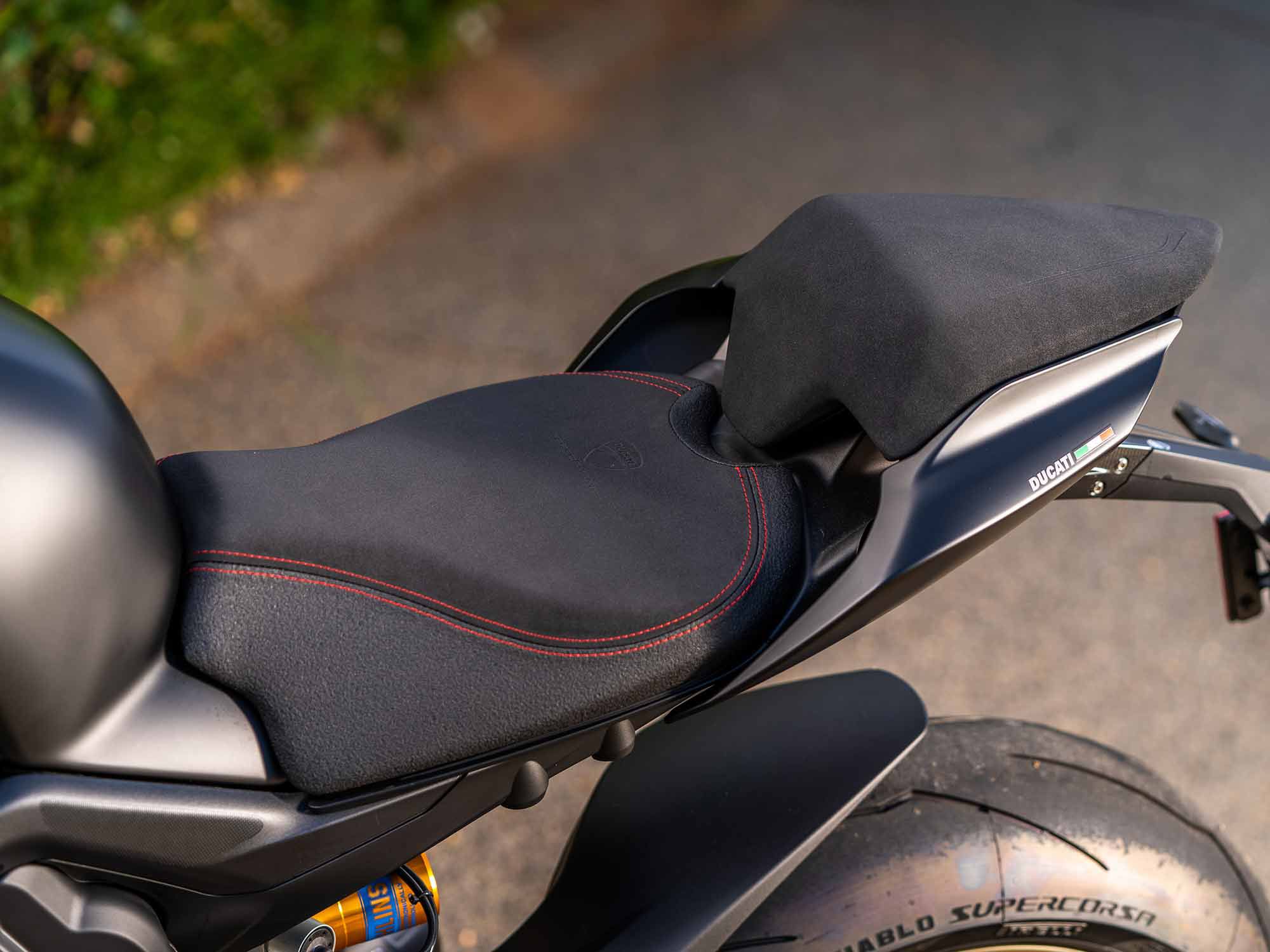 The accessory racing seat offers a surprisingly level of comfort. However, it’s a tad too grippy for our taste. Short riders beware, however. It raises the seat height to just over 34 in.