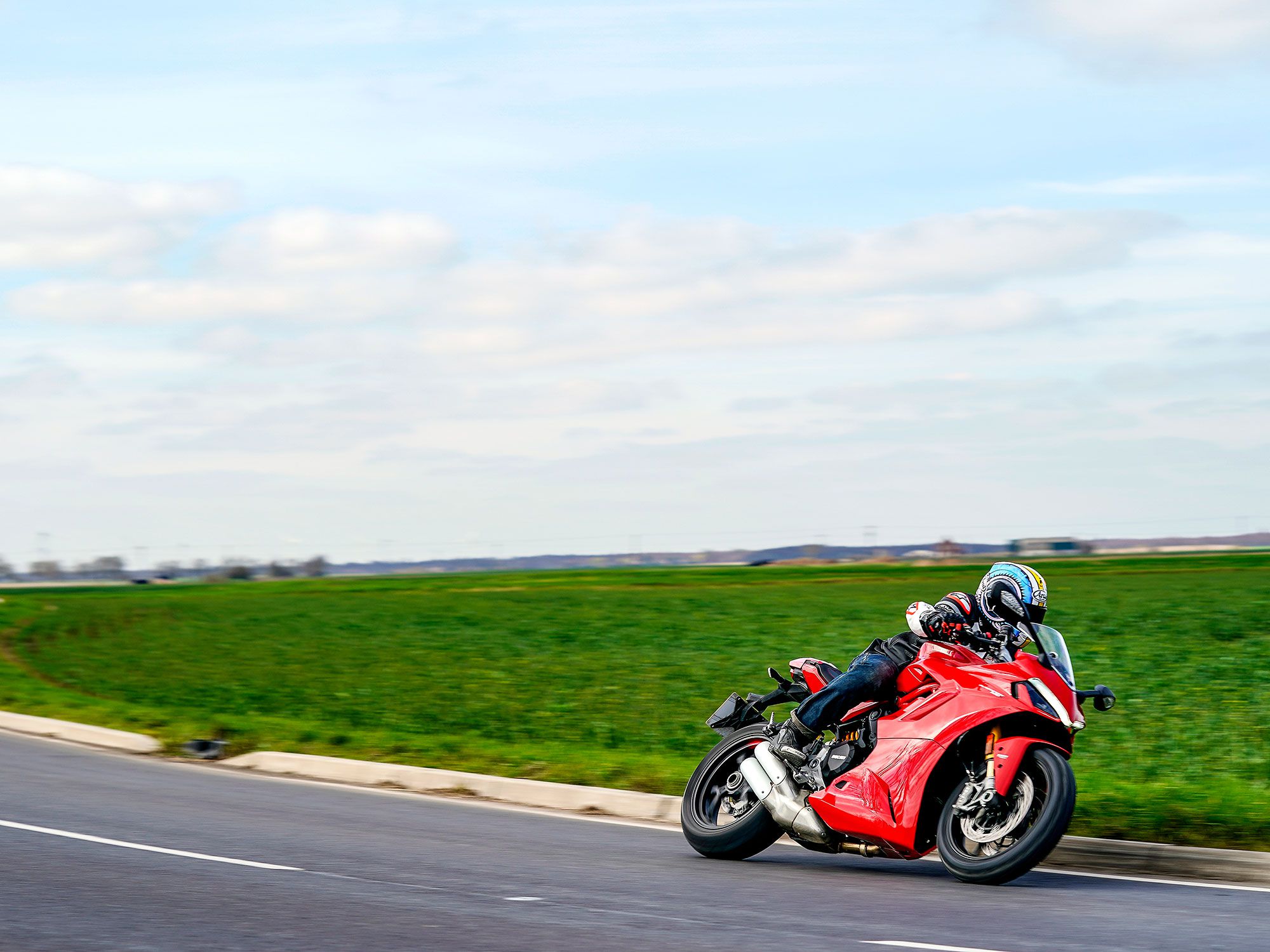 The traction control is set from 1–8 or off, Sports mode is 3, Touring 4, and Urban 6. Wheelie control is out of 1–4 and off, Sport set to 2, Touring 3, and Urban 4.