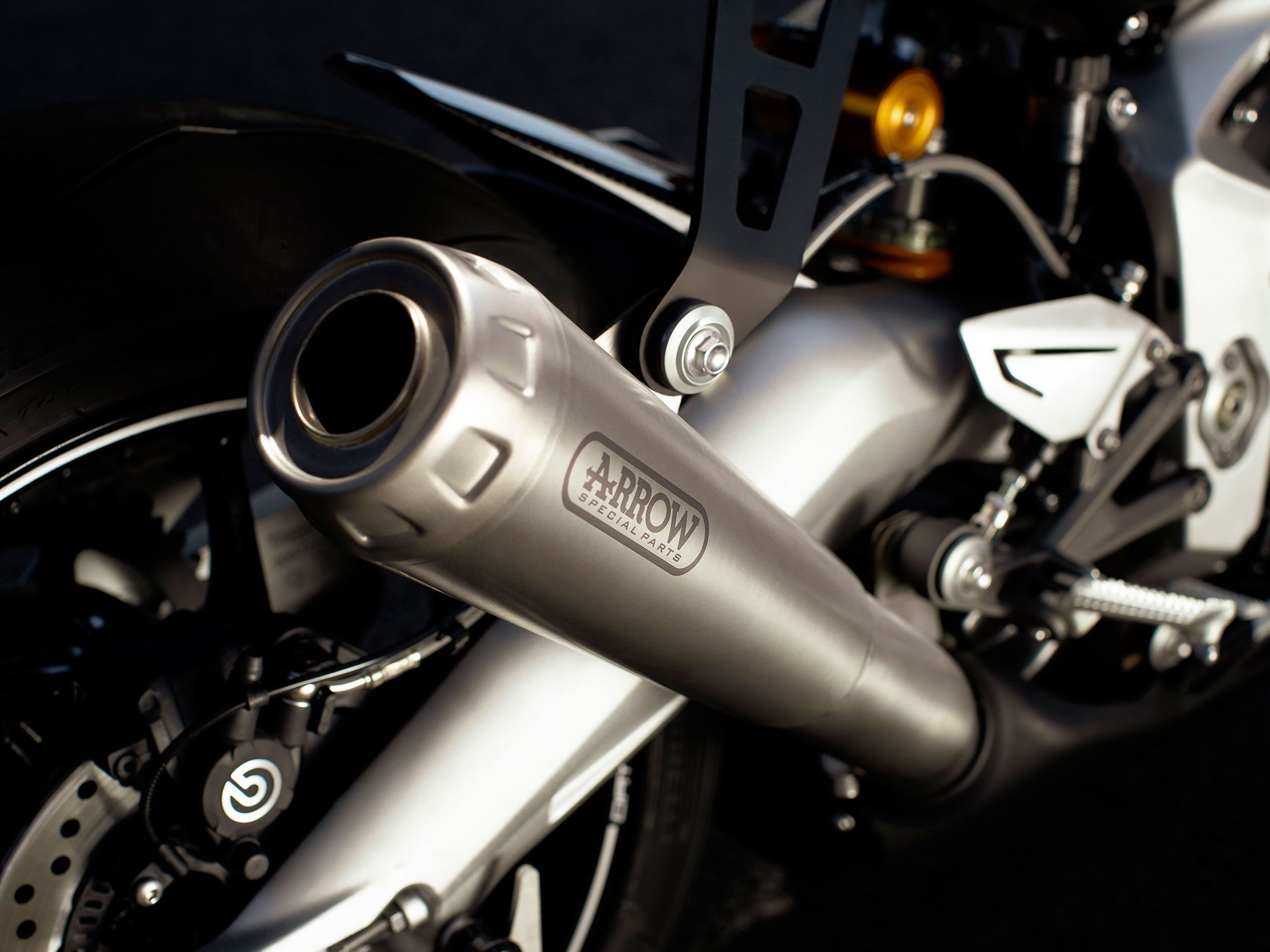 We love the charismatic and fun-loving howl that Triumph’s I3 produces. It sounds even sweeter with this titanium muffler from Arrow.