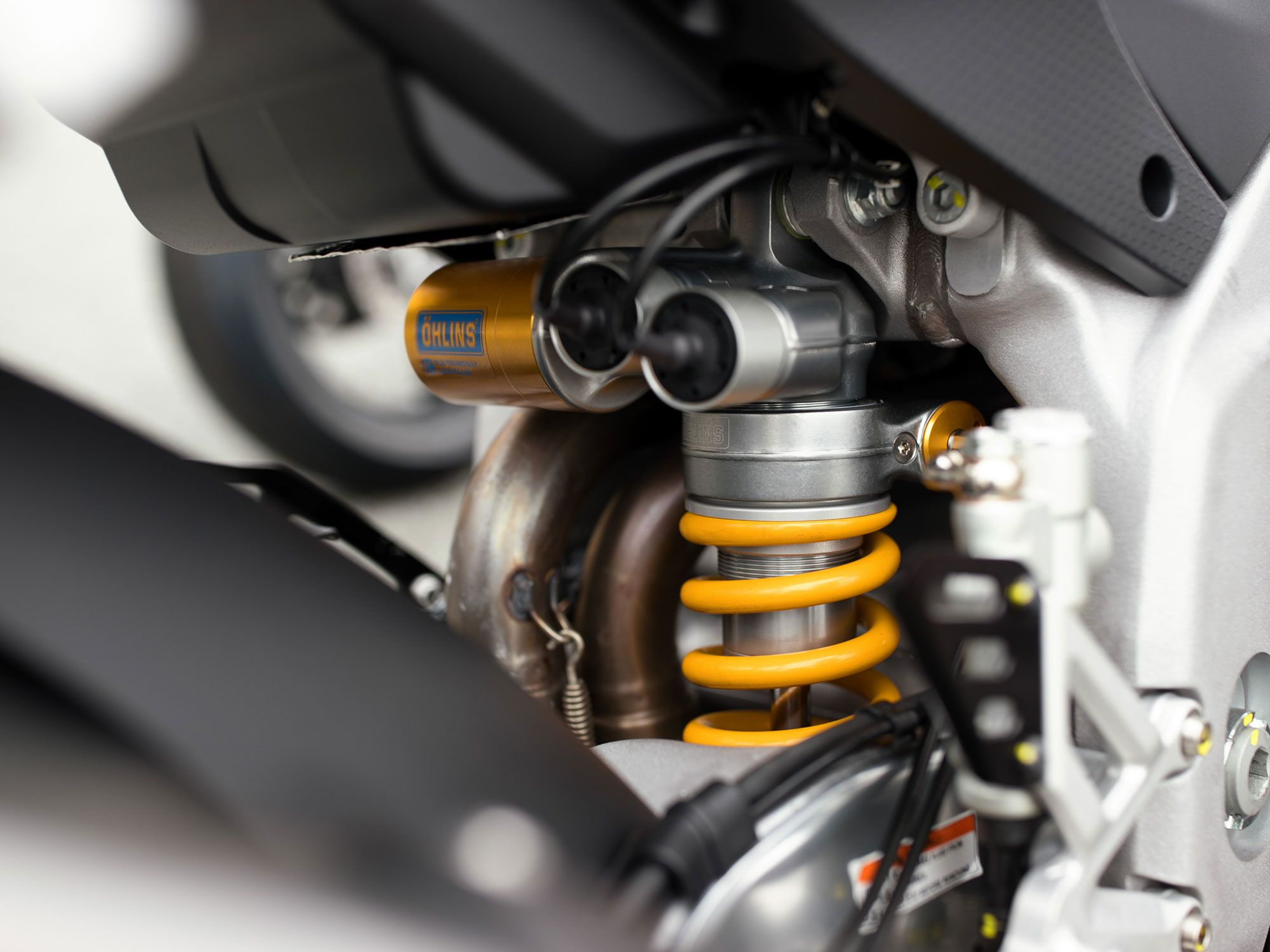 The Factory’s semi-active Öhlins suspenders help take the guesswork out of suspension setup.