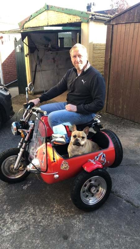 Ken Cross with his two French bulldogs and his new sidecar for puppers