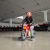 kid having fun with MV Agusta's new Vintage Wooden Balance Bike