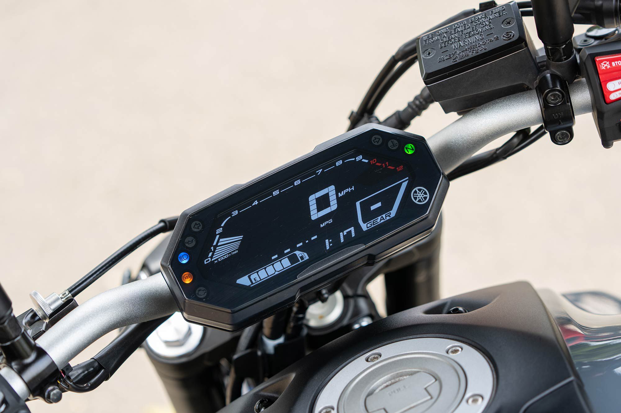 The instrument package is easy to read day and night. We like that screen brightness can be adjusted for night riding.
