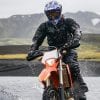 a rider enjoying a wet day on a motorcycle tour by Wild Triumph