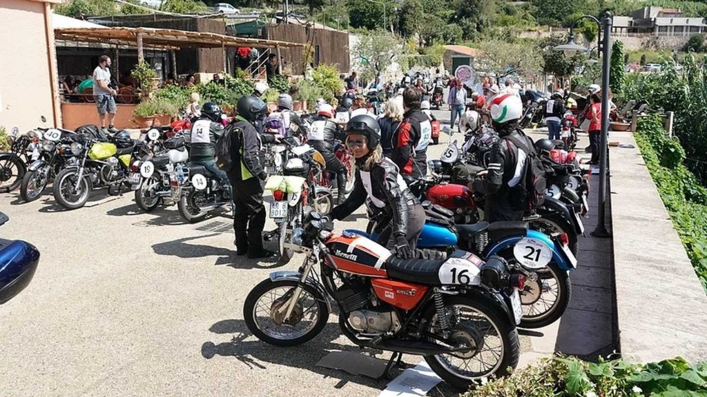A view of riders preparing for the fifth annual Dario Sebaste Trophy amateur vintage motorcycle race. 