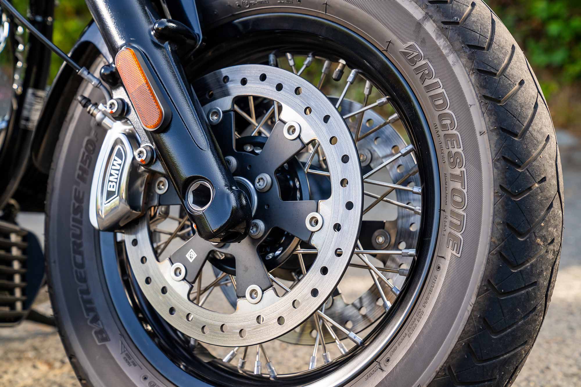 Triple-disc hydraulic brakes with equally sized discs and calipers keep speed in check for this 805-pound cruiser. The brakes offer pleasing calibration and are neither too soft, nor too sharp.