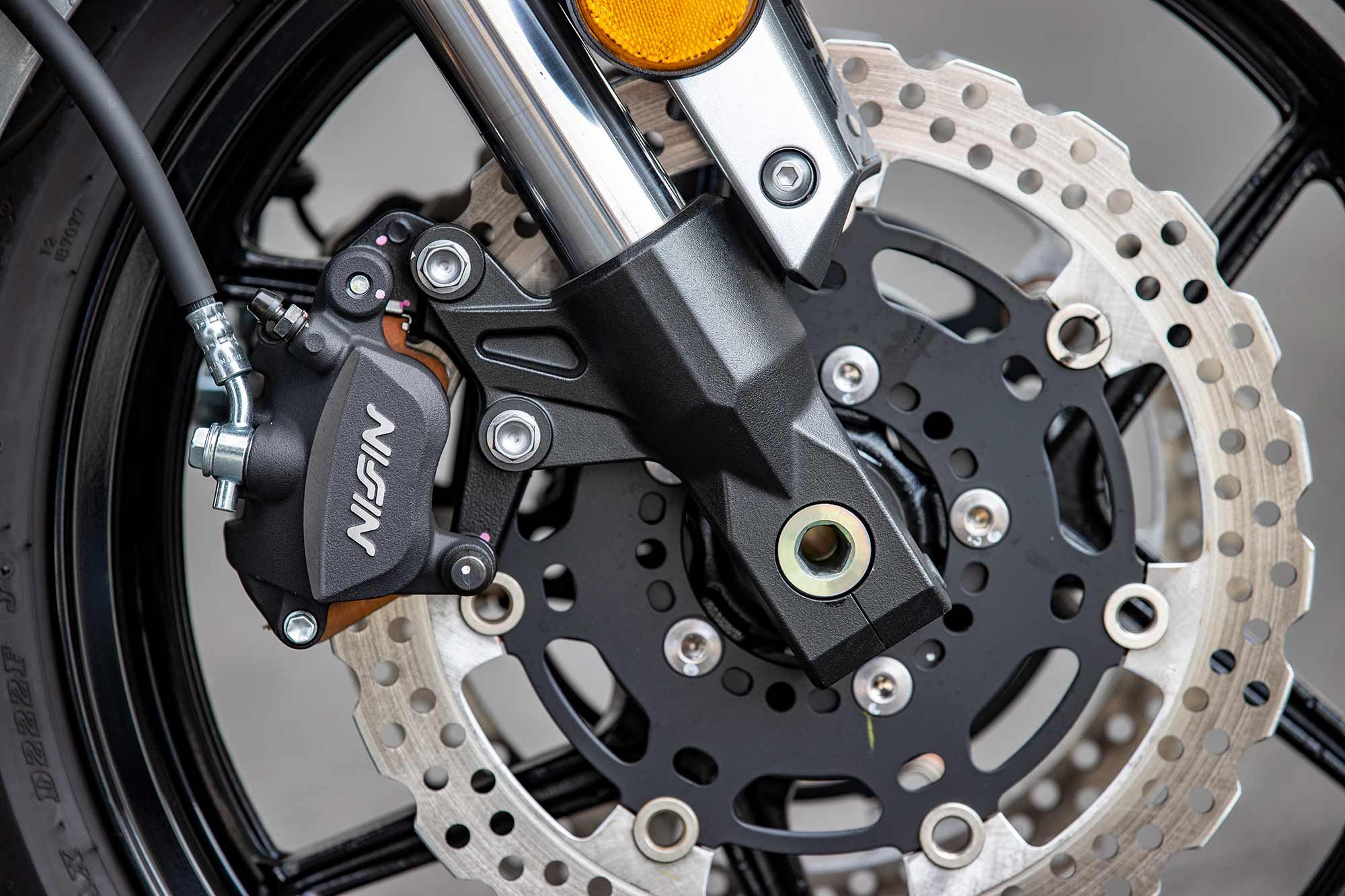 Kawasaki employed a pair of axial-mounted Nissin two-piston calipers and 300mm discs up front. A swap to an aftermarket brake pad may improve feel.