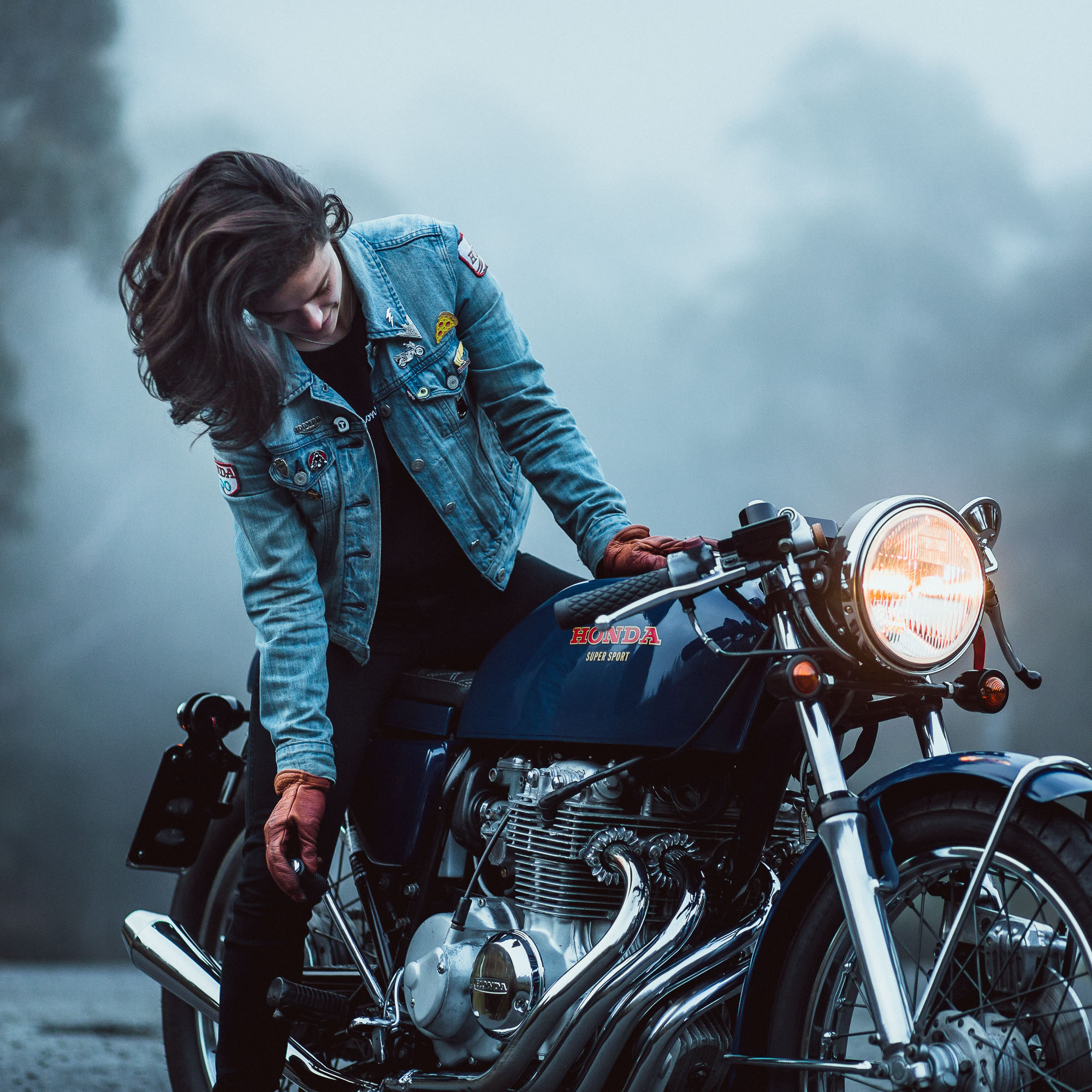  Katie Abdilla in Tasmania seated on her Honda CB400 Four Motorcycle