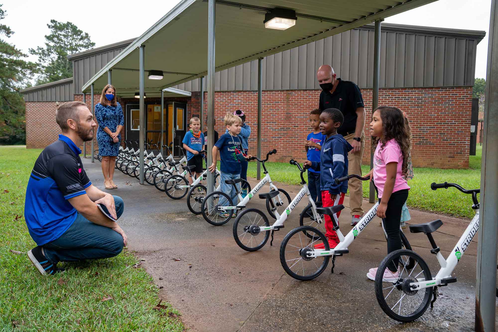 The All Kids Bike program teaches kindergarteners how to ride a bicycle, encouraging balance, confidence, mobility, and physical activity.