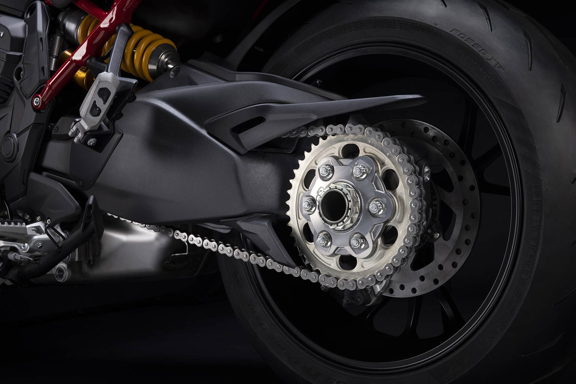 A single-sided swingarm is another sporty touch.