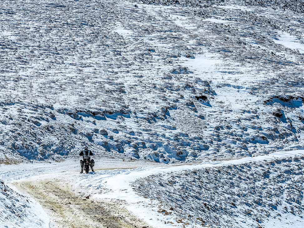 Paul Stewart (aka rtwPaul) riding after a mid-September blizzard on Engineer Pass in Colorado.