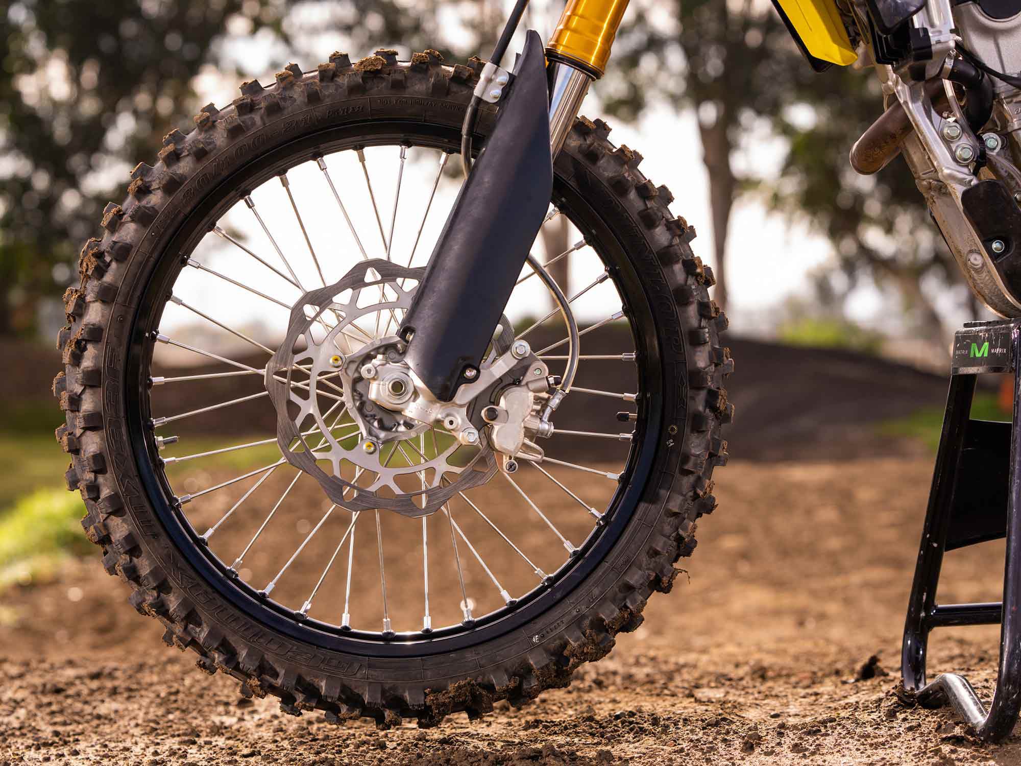 In standard dirt bike form, the RM-Z rolls on a 21-inch front spoked wheel. The front brake offers pleasing stopping power but we wish it had a more aggressive pad compound.