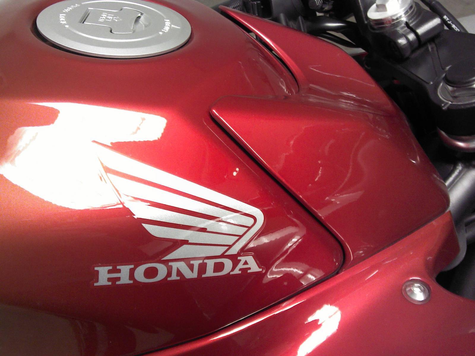 Closeup of honda motorcycle fuel tank