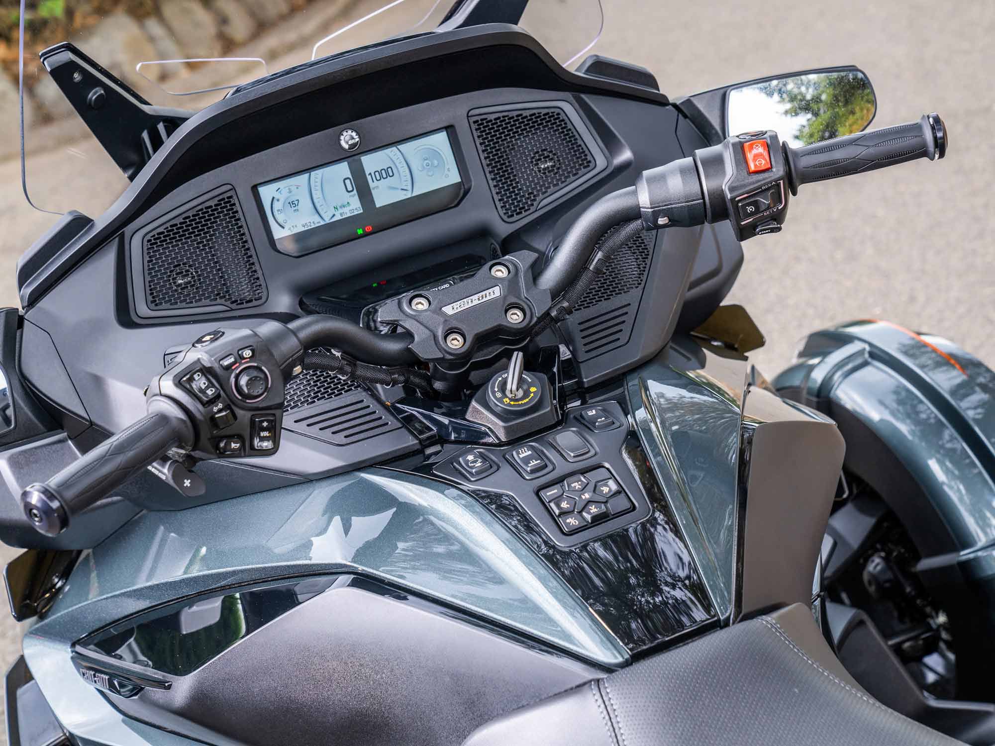 The Spyder RT offers a cozy cockpit. We love its broad front end, which does a fine job of shielding the rider from the elements. Instrumentation, however, needs to be larger.