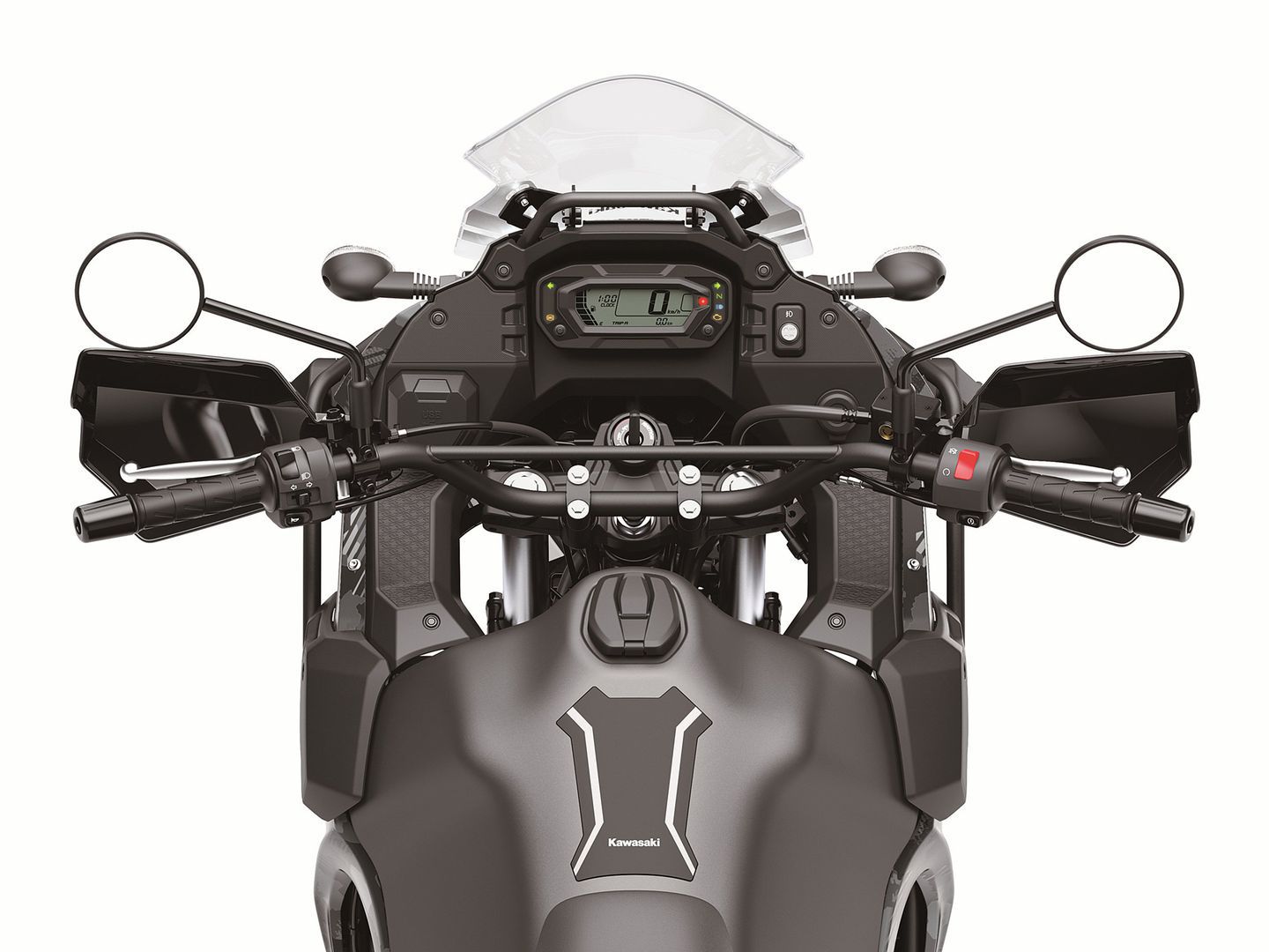 The 2022 KLR’s cockpit: a new LCD instrument pod; wider, rubber-mounted handlebar; wider mirrors; a taller, two-position adjustable windscreen; an integrated accessory mounting bar; and two optional power sockets.