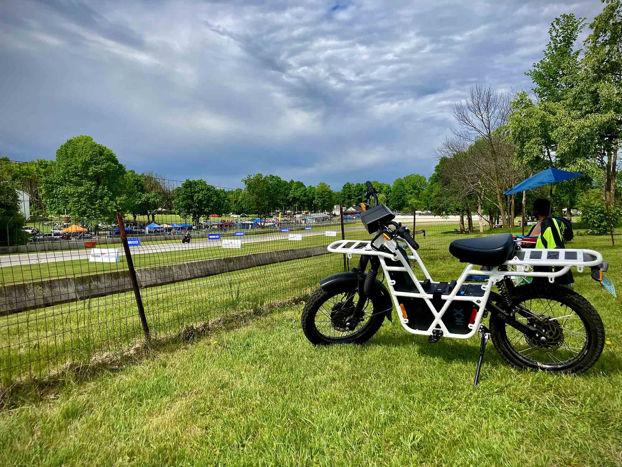 Off to the races: light pitbike duty at Road America’s turn 1.