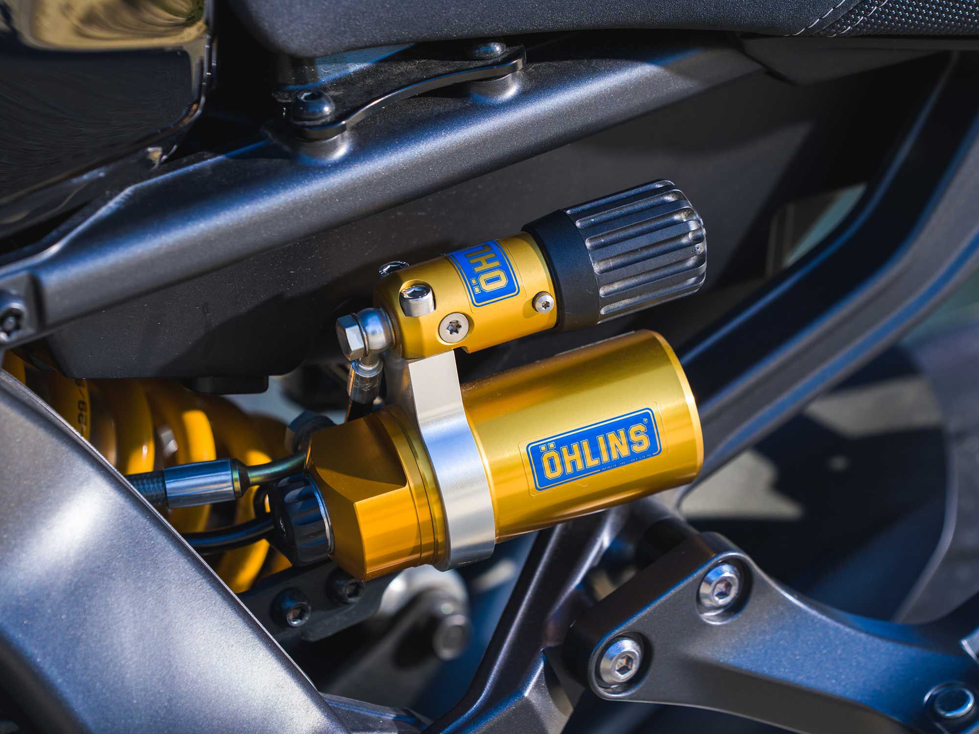 A hydraulic preload adjuster allows the rider to tweak rear ride height based on handling preference or vehicle load.
