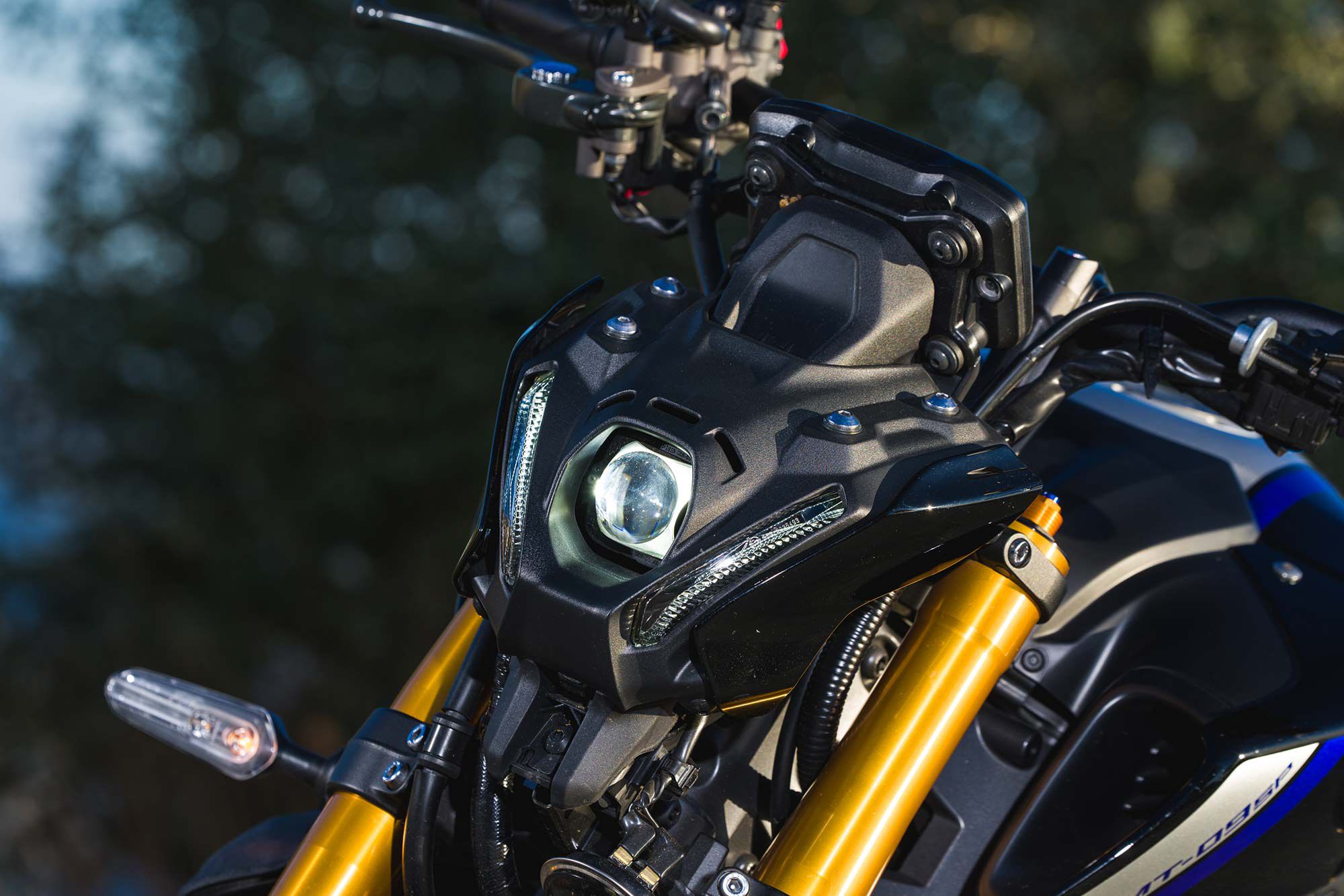 Although it looks tiny, the MT’s LED headlamp throws off a nice spread of light for night rides.