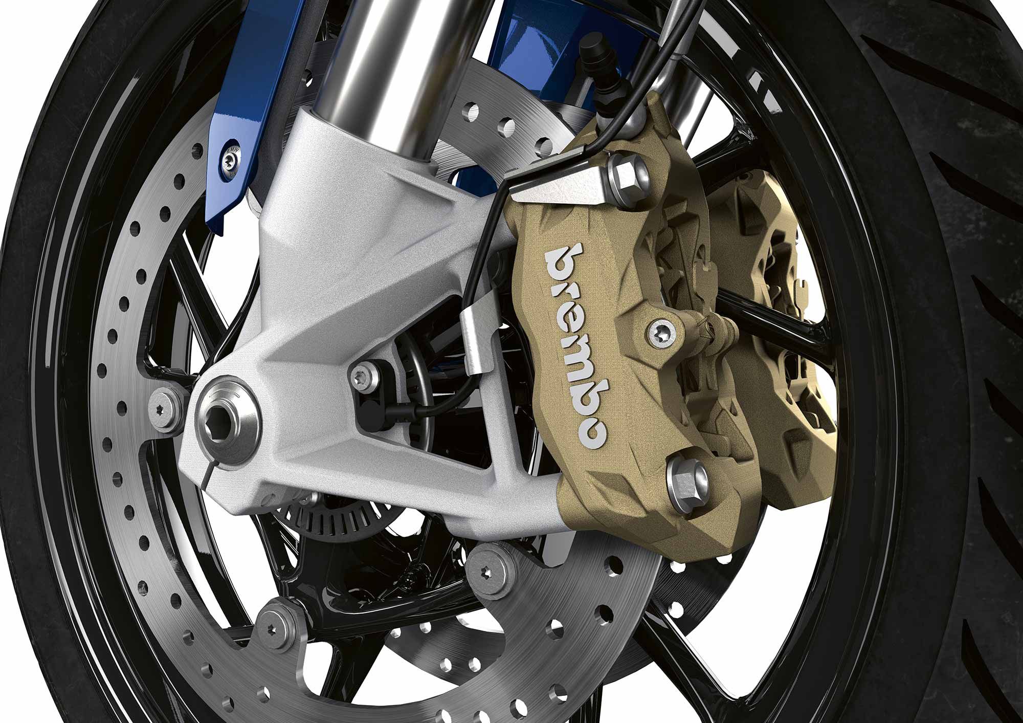 Brembo four-piston calipers grip 320mm discs at the front.