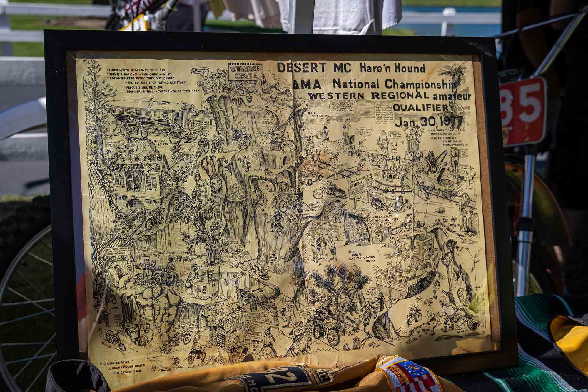 Desert racing memorabilia, such as this race poster from 1977, were on display from a number of clubs and organizations in attendance.
