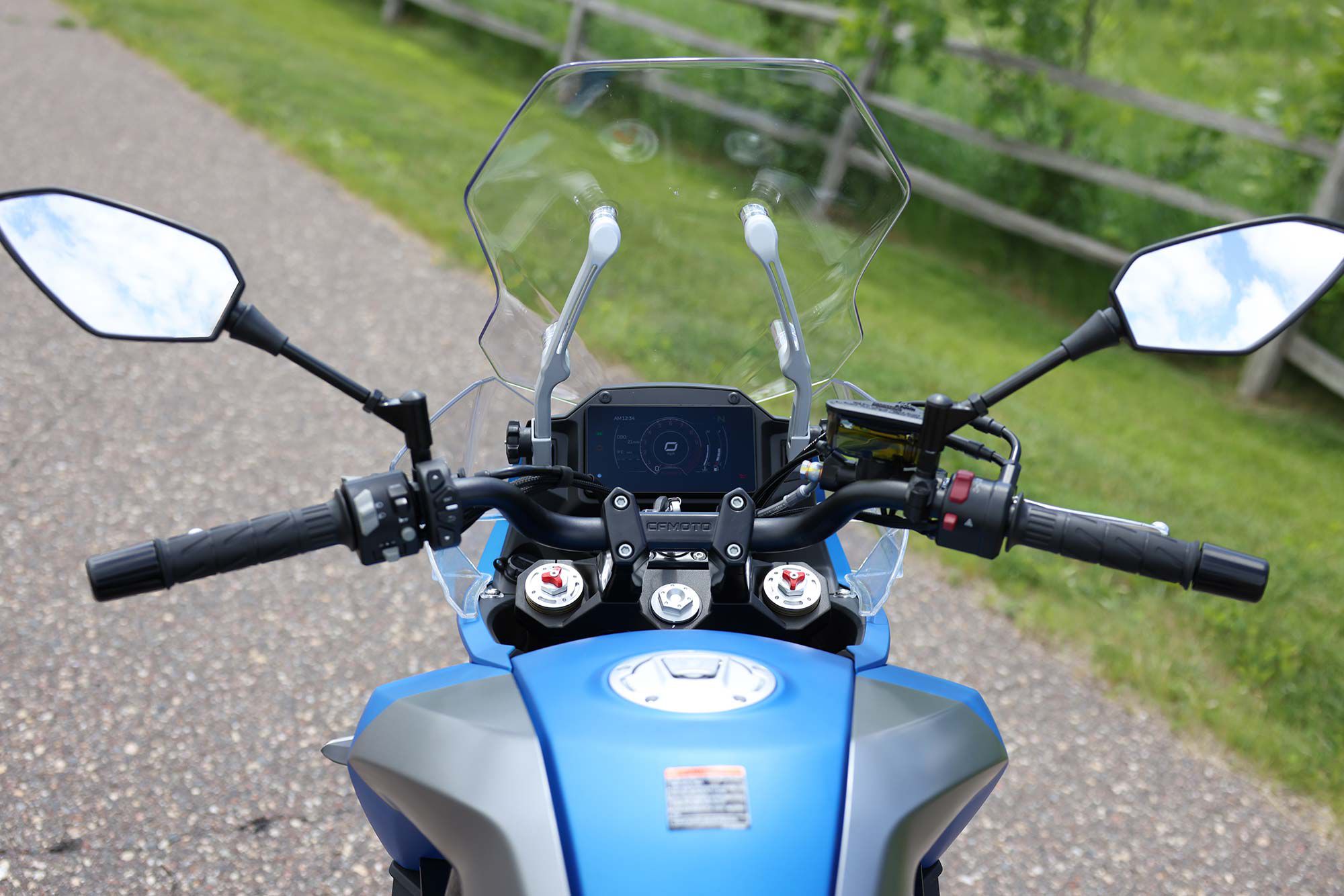 The windscreen is adjustable and provides great wind protection for long-distance touring, though it can trap heat near the cockpit.