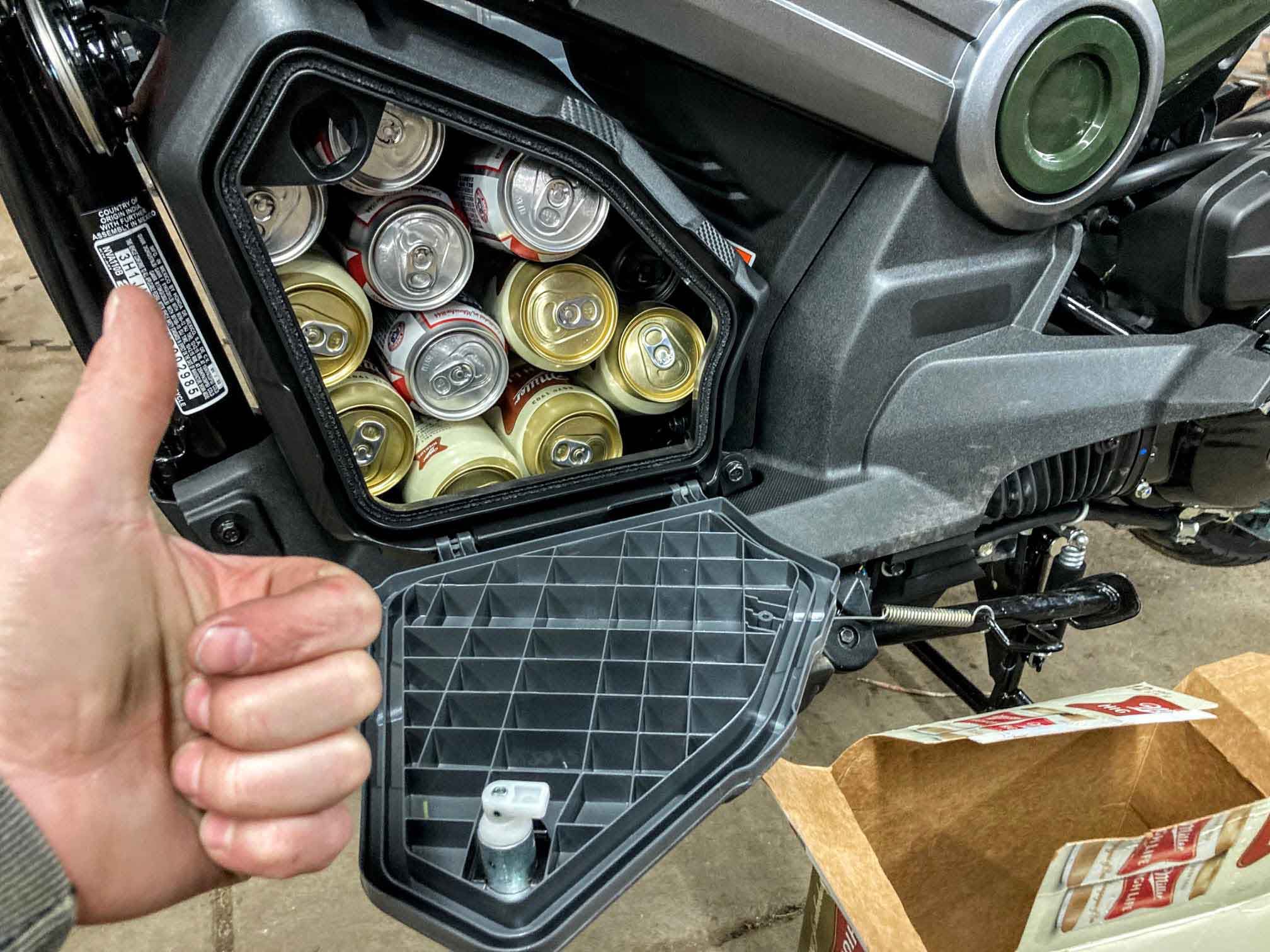 <i>Motorcyclist</i> officially discourages the consumption of alcohol while riding. But 24 beers fit in a Navi.