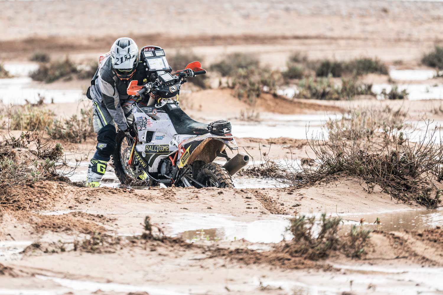 James Pearson, American Rally Originals KTM, fights the good fight in the mud in Stage 9.