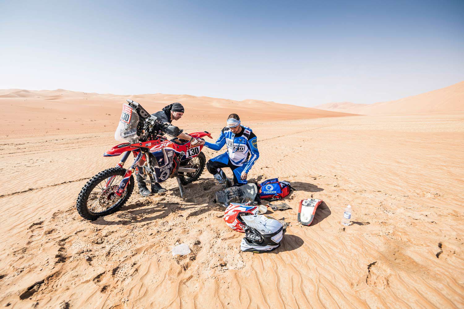 Eufrasio Anghileri, RS Moto Racing, takes stock of his Honda (and whatever went wrong) during Stage 11, between Shaybah and the Empty Quarter. His father, Antonio, competed on a Gilera in the ’90s.
