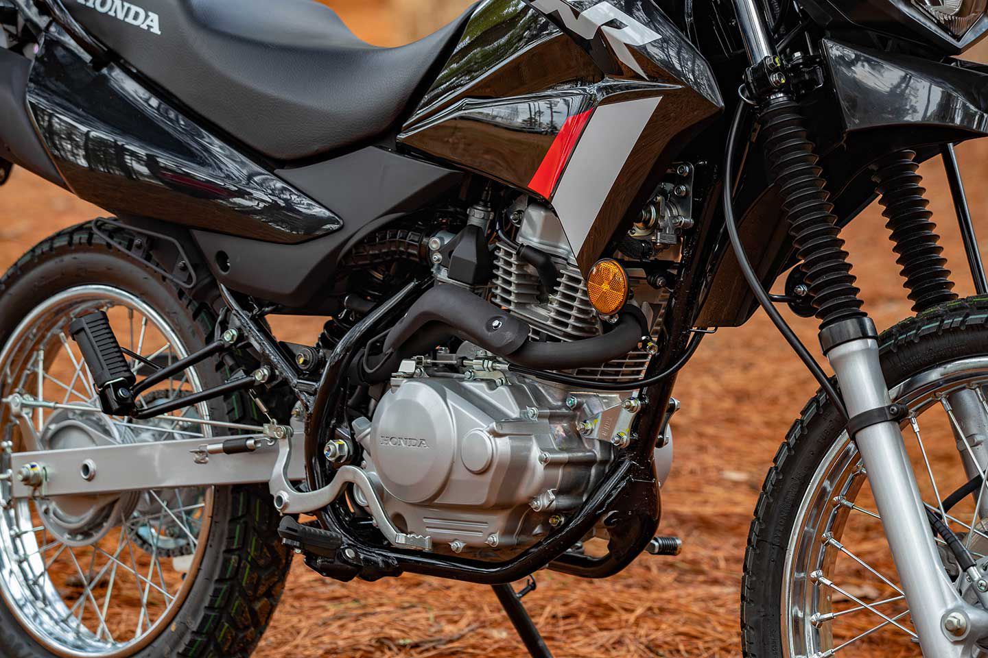 The apple doesn’t fall far from the tree. Like the larger-displacement XR, the XR150L’s engine is air-cooled and uses a carburetor for fueling.