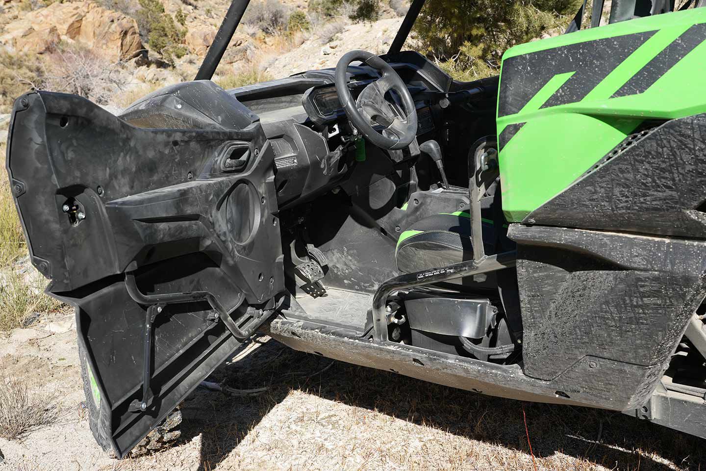 Tall doors with automotive-style latches help keep occupants safe. For ‘23, Kawasaki’s Teryx features improved steering wheel material, an updated floorboard design to better evacuate debris and ride-by-wire throttle.