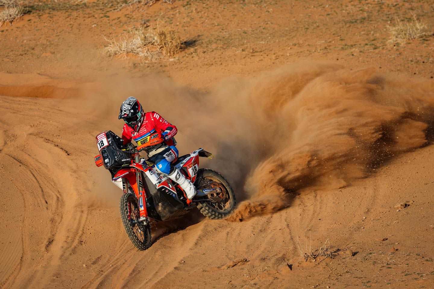 Bradley Cox (18), of the BAS World KTM Racing team, does some drifting in the desert.